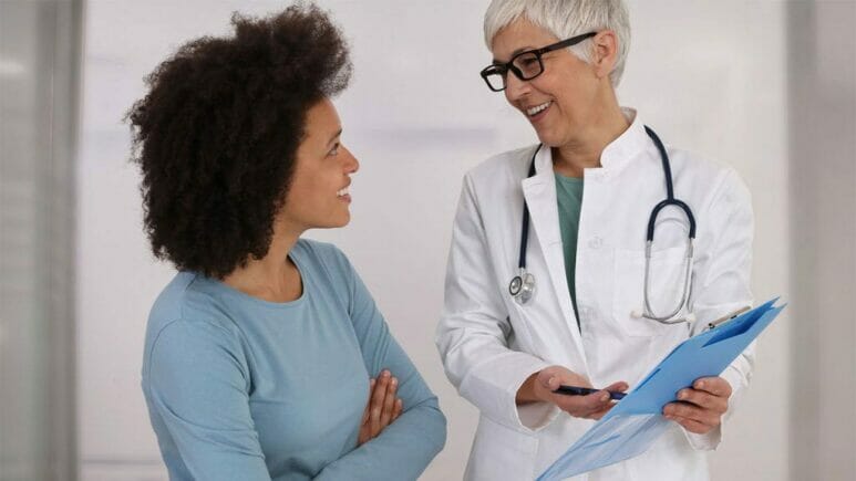 doctor explaining test results to patient