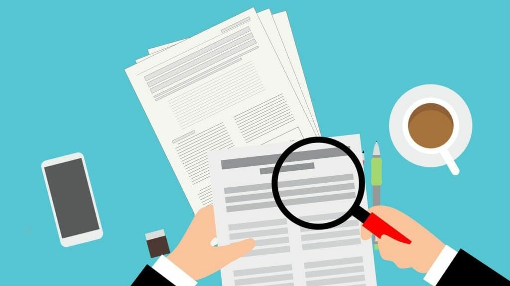 graphic depicting authorization forms spread out on a table with a cup of coffee, phone, and someone using a magnifying glass to inspect the forms